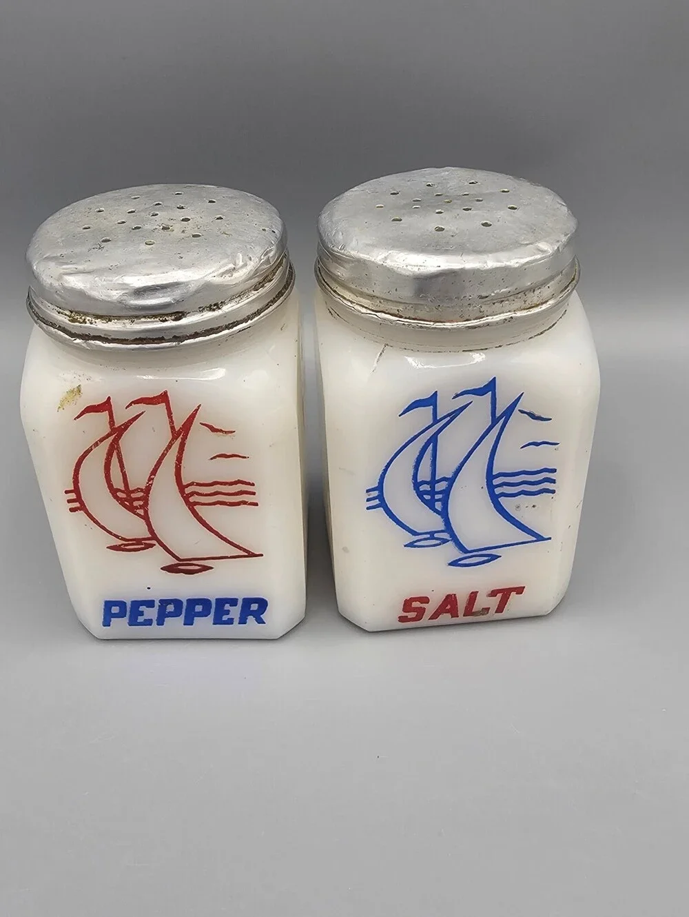 Vintage Milk Glass Salt and Pepper Shakers with Sailboat Design